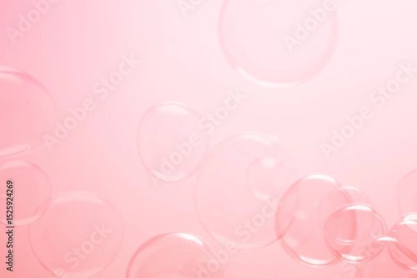 Fototapeta Beautiful Clear Pink Soap Bubbles Floating in The Air. Celebration Festive Backdrop. Freshness Soap Suds Bubbles Water. Pink and White Gradient Textured.	
