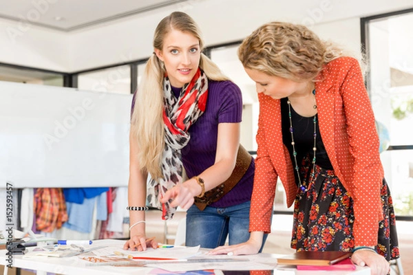 Obraz Two office workers at the desk