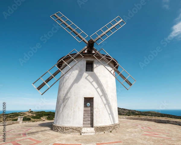 Fototapeta The Moulin Mattei windmill, built at the end of the 18th century, stands on the Cap Corse peninsula on the Mediterranean island of Corsica