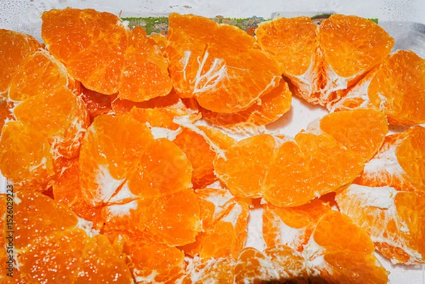 Obraz Fresh Orange Slices on Orange Background – Citrus Fruit Texture and Pattern