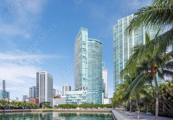 Fototapeta Modern skyline of Miami with towering skyscrapers, tropical vibe, and waterfront views