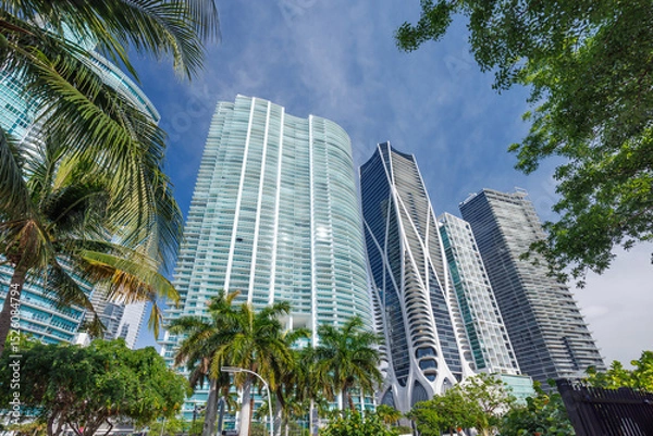 Fototapeta Modern skyline of Miami with towering skyscrapers, tropical vibe, and waterfront views