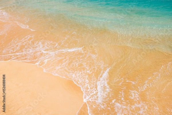 Fototapeta Sunny beach in Hawaii with golden sand and clear blue water