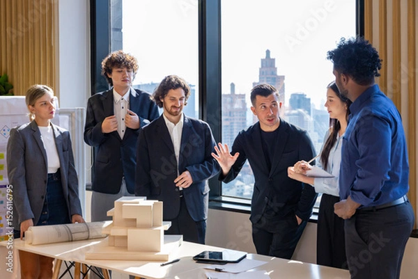 Fototapeta Team of architect, engineer and businessman having meeting on new property and real estate development project over the design and safety for modern living space in urban downtown