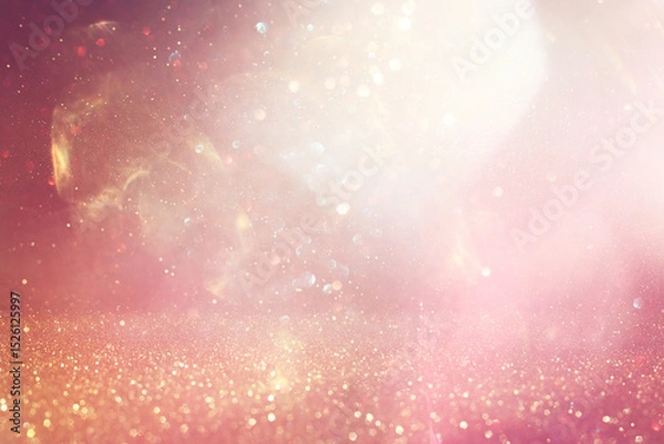 Fototapeta abstract glitter pink and gold lights background. de-focused