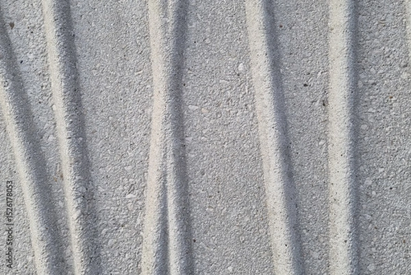 Fototapeta Textured Concrete Surface with Parallel Grooves for Architectural Design and Background Use