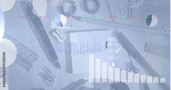Fototapeta Image of infographic interface over group classes text on sticky notes and stationery on table