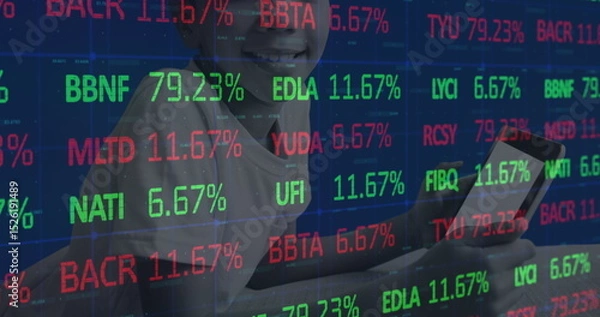 Obraz Image of stock market over african american boy using tablet