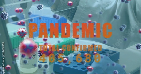 Fototapeta Image of virus cells and pandemic text over caucasian doctor