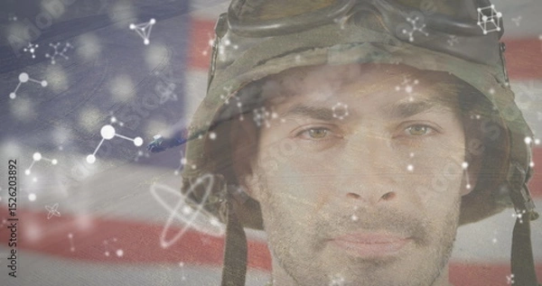 Fototapeta Image of graphics rotating over portrait of caucasian young army soldier and landscape
