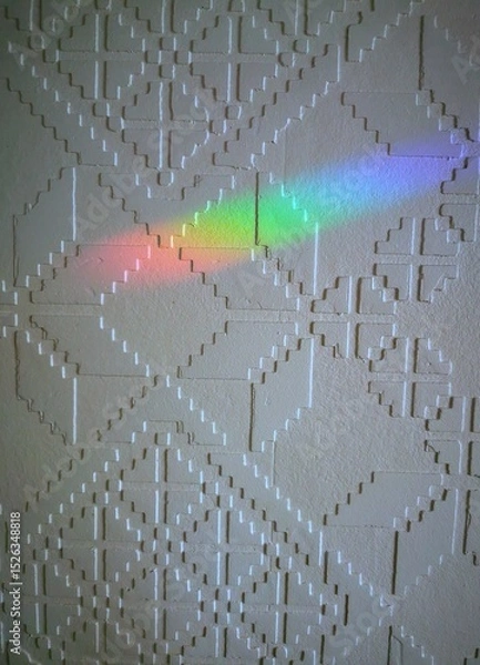 Obraz Rainbow light reflection on white wall with geometric pattern background