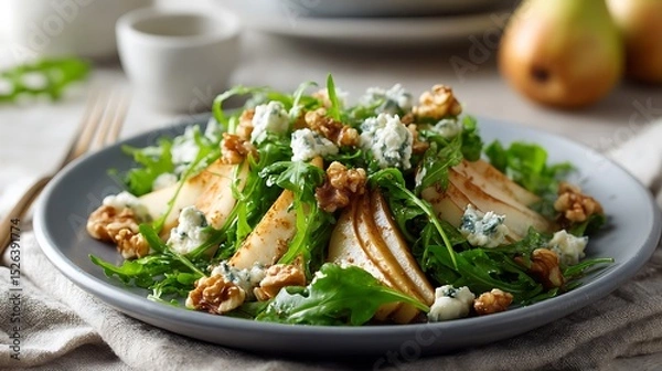 Fototapeta Pear and Arugula Salad with Walnuts and Blue Cheese