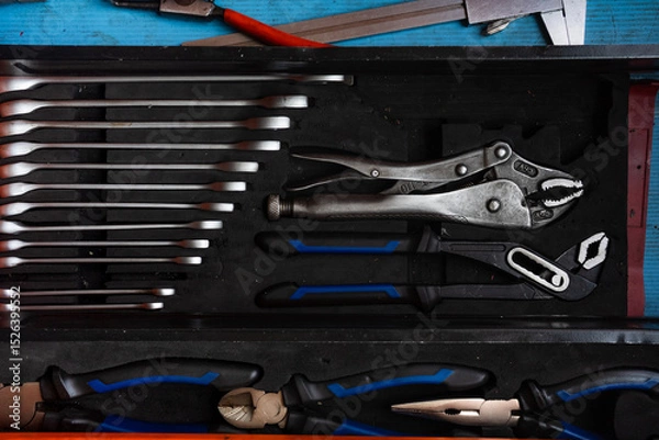 Fototapeta Professional work tools set for technicians in a stylish box.