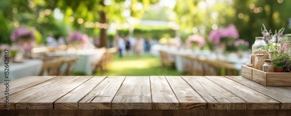 Fototapeta Rustic Wooden Table with Flower Arrangement in an Outdoor Dining Setting for Celebrations and Gatherings