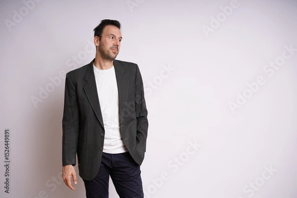 Fototapeta Male Model Showing Different Emotions on White Studio Background
