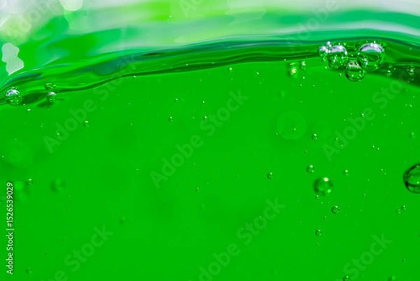 Fototapeta Water wave, close up of vibrant green liquid with bubbles, capturing dynamic movement and freshness. Perfect for backgrounds, beverages, or abstract concepts. soft drink