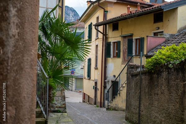 Obraz Ancient stone arches, weathered walls, medieval charm, Italian old town atmosphere, timeless travel destination region Piedmont, Old European district
