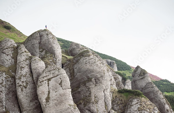 Obraz silhouette of a man on a rock cliff