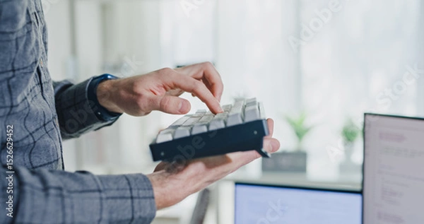 Fototapeta Closeup young adult male freelance developer typing write prompt AI bot app program nomad terminal with coding at office. Artificial intelligence dashboard, robotics, user interface, machine learning.
