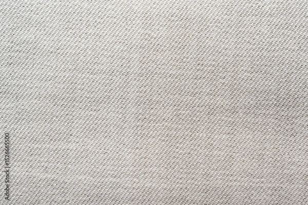 Fototapeta Texture of light gray fabric. Textile. Canvas. silk white material