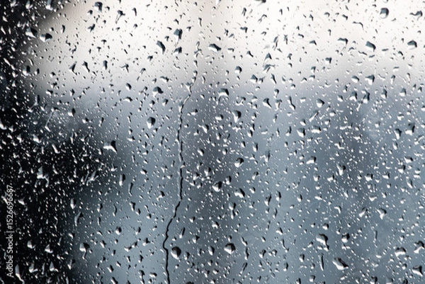 Fototapeta A window with raindrops on it