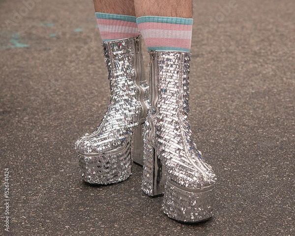 Fototapeta Los Angeles, CA, USA – June 8, 2025: Close-up of a participants sparkling platform boots at the .LA Pride Parade in Los Angeles, CA.