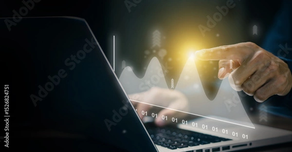 Fototapeta Businessman analyzing virtual graph chart on laptop screen. Concept of data analysis, financial growth, performance tracking, digital technology, and business intelligence.