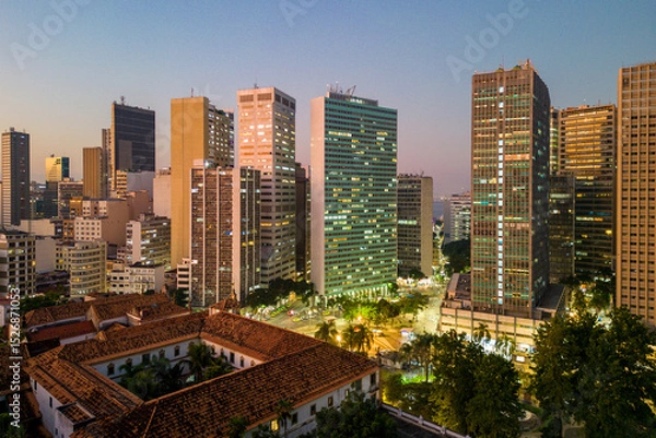 Fototapeta Skyline of Rio de Janeiro City Downtown With Office Buildings in the Evening and Carioca Square Below