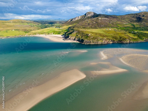 Fototapeta Aerial view of sand banks in a shallow bay with rocky coastline, Kyle of Tongue, Scotland