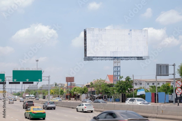 Fototapeta Billboard / View of empty billboard for advertisement and traffic road. Movement.