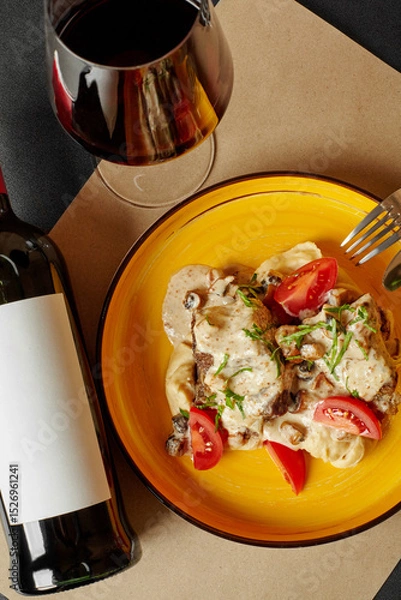 Fototapeta Beef with mushroom cream sauce, mashed potatoes, tomatoes and red wine pairing