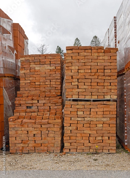 Fototapeta Old Style Orange Bricks at Stacked Pallets Construction Material Storage
