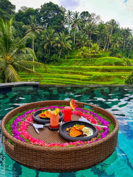 Obraz A floating breakfast, typically served in a private pool at a resort