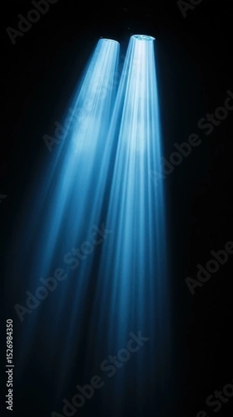 Fototapeta Dramatic lighting illuminating darkness, stage spotlights with light rays, glow shining down from above, light beams, copy space