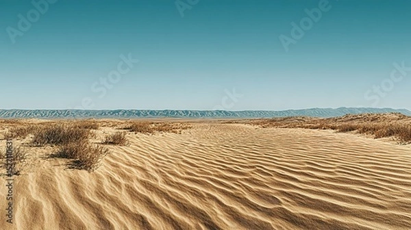 Obraz Vast sandy plains under a clear sky.