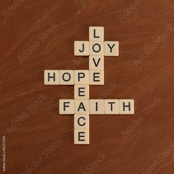 Fototapeta Crossword puzzle with words Faith, Hope, Love. Faith concept.