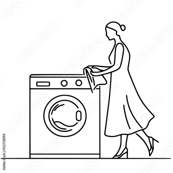 Obraz Woman placing clothes in washing machine in minimalist home design  
