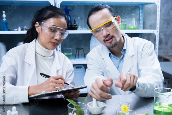 Fototapeta Scientist used biochemistry to test each organic ingredient in the laboratory, ensuring the cosmetic skincare product met safety standards before release.