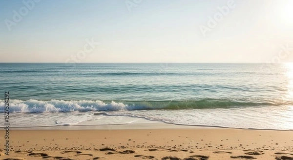 Obraz Tranquil beach scenery with gentle waves clear sky