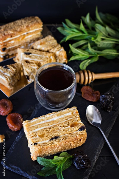 Obraz Honey cake on a dark background