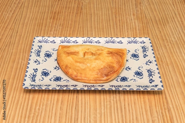 Fototapeta Empanadillas, due to their size, benefit most from frying, although some empanadas are also deep-fried