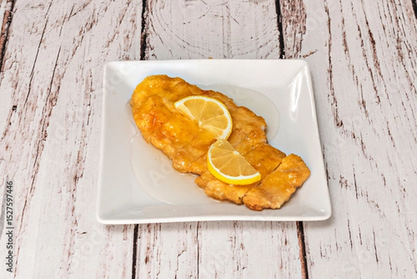 Fototapeta  in the West, frying is more prevalent, especially in dishes such as lemon chicken,