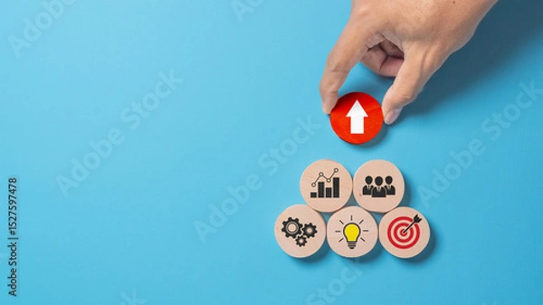 Fototapeta Business development strategy and action plan concept on wooden blocks