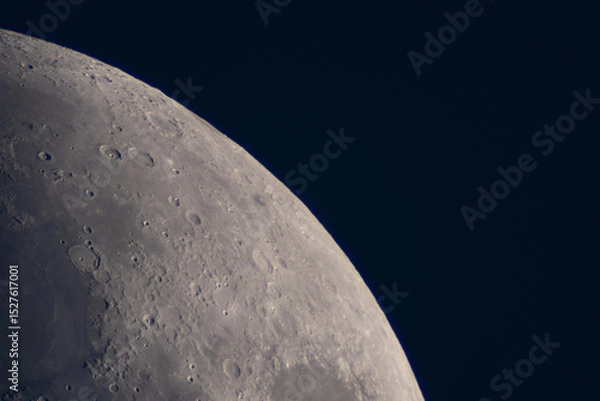 Fototapeta Detailed lunar surface view highlighting illuminated craters and plains. Planetary astrophotography Satellite of the Earth