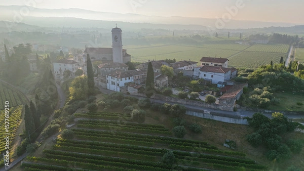 Fototapeta Scenic Tuscan Landscape with Olive Groves and Vineyards at Golden Hour – Idyllic Countryside in Italy