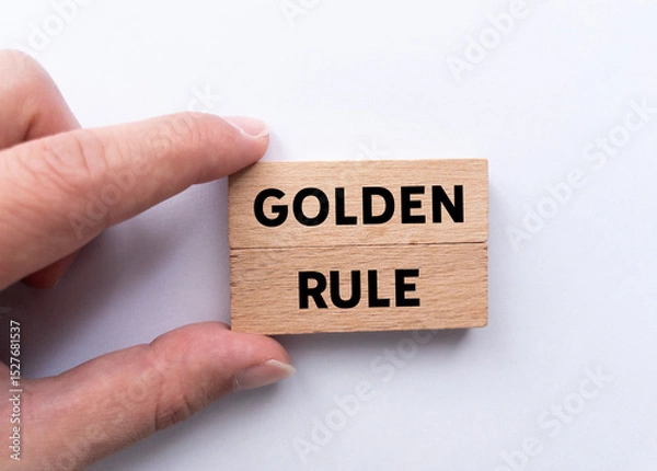 Obraz Golden rule message written on wooden blocks on white background. Conceptual golden rule  symbol. Copy space.