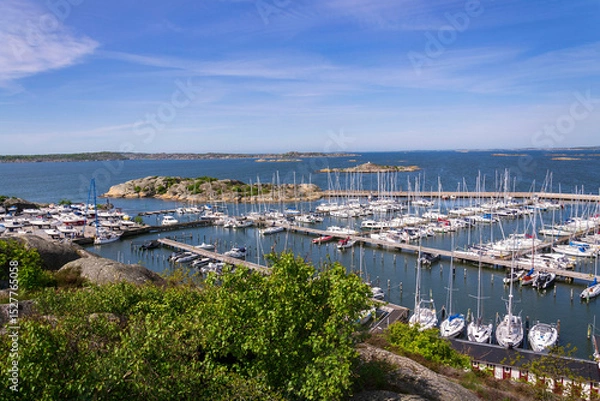 Obraz Ships harbour at Saltholmen peninsula on the shore of Alvsborgsfjorden, harbour for archipelago ships, Alvsborg district, Gothenburg, Sweden, sunny day