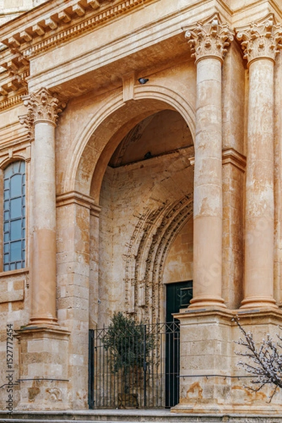 Fototapeta Elegant Baroque Side Entrance of Ciutadella de Menorca Cathedral. Historic Spanish architecture, classical columns, religious building, Mediterranean island, travel landmark