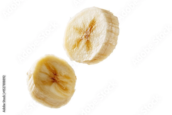 Fototapeta Flying banana slices in the air isolated on transparent background