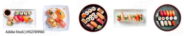 Fototapeta Set of sushi sets with nigiri, rolls, and dipping sauce on plates from top view isolated on transparent background